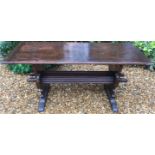 A RARE 17TH/18TH CENTURY ITALIAN OAK AND ELM TABLE The plank top raised on lyre supports, joined