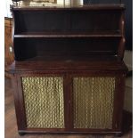 A REGENCY MAHOGANY CHIFFONIER With brass gallery above open shelves and a fold over writing surface,
