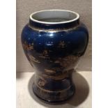 A 19TH CENTURY CHINESE PORCELAIN COBALT POWDER BLUE VASE Decorated in gilt, with landscape