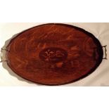 AN EDWARDIAN OAK AND MARQUETRY INLAID BUTLERS TRAY Of oval shape, with a scalloped gallery, twin