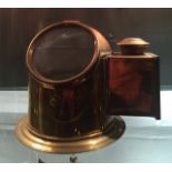 A 20TH CENTURY BRASS SHIPS BINNACLE.