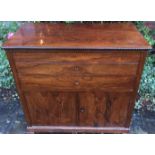 A 19TH CENTURY ROSEWOOD WASHSTAND CHEST The fold over top concealing a marble surface, above