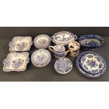 A VICTORIAN OPAQUE CHINA FRUIT SET Comprising two serving plates and twelve bowls, together with a