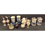 A COLLECTION OF EARLY 20TH CENTURY DECORATIVE POTTERY VASES AND EWERS To include a pair of