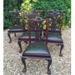 A SET OF SIX GEORGIAN DESIGN SOLID MAHOGANY DINING CHAIRS With pierced and carved back splats and