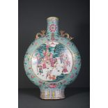 A LARGE QING DYNASTY 19TH CENTURY FAMILLE ROSE MOON FLASK The flat rounded body rising from a tall