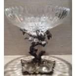 A VICTORIAN SILVER PLATED AND LEAD CRYSTAL EPERGNE Cast to represent trailing vine leaves and