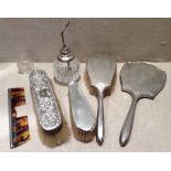 AN EARLY 20TH CENTURY HALLMARKED SILVER DRESSING TABLE SET Comprising a hand mirror, with Art Deco