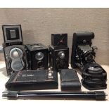 A COLLECTION OF VINTAGE CAMERAS Including a Flexret Automatic twin lens camera, an Ensign full view,