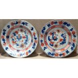 A PAIR OF 18TH CENTURY CHINESE PORCELAIN PLATES Hand painted in underglaze blue, red and gold,