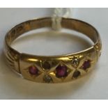 A VICTORIAN HALLMARKED 18CT GOLD, RED SPINEL AND DIAMOND GYPSY RING The three slightly graduated (