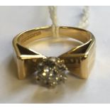 A VINTAGE HALLMARKED 18CT GOLD AND DIAMOND SOLITAIRE RING The brilliant cut diamond illusion set, in