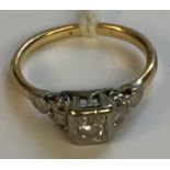 A MID 20TH CENTURY 18CT GOLD AND DIAMOND SOLITAIRE RING The brilliant cut diamond in a square