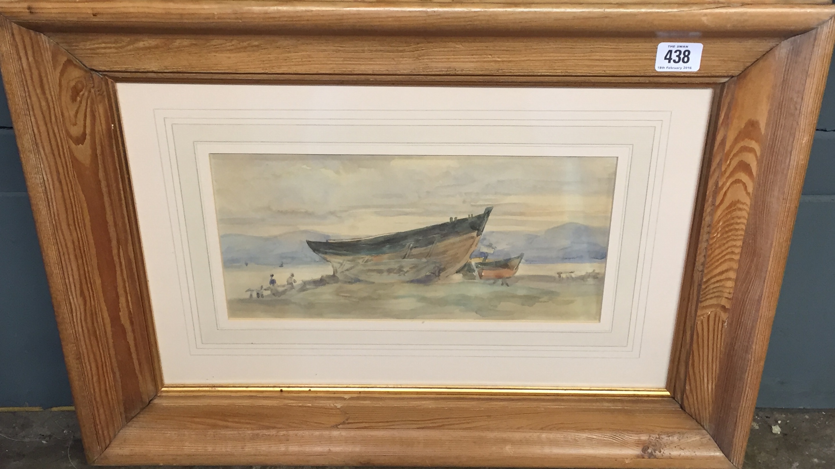 A LATE 19TH/EARLY 20TH CENTURY WATERCOLOUR Beached boats, contained in a deep cushion pine frame and