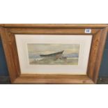 A LATE 19TH/EARLY 20TH CENTURY WATERCOLOUR Beached boats, contained in a deep cushion pine frame and