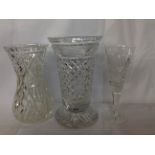 A COLLECTION OF THREE 20TH CENTURY CUT LEAD CRYSTAL VASES Comprising a large tapering vase, cut with