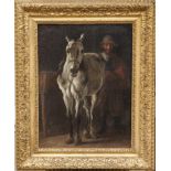 A 19TH CENTURY FLEMISH SCHOOL OIL ON CANVAS A horse and groom in a stable. (20" x 24")