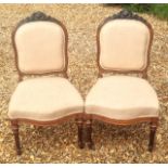 A GOOD PAIR OF VICTORIAN MAHOGANY STANDARD CHAIRS Crested with a shell and floral cartouche above