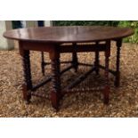 A LARGE EARLY 19TH CENTURY OAK DOUBLE GATELEG TABLE