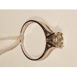 AN 18CT WHITE GOLD AND DIAMOND SOLITAIRE RING The brilliant cut diamond in a six claw setting, to