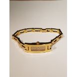 GUCCI, 3900L, A LADIES' GOLD PLATED WRISTWATCH On an integral strap. NS33