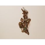 AN EDWARDIAN 15CT ROSE GOLD AND SEED PEARL BROOCH Of foliate design, undulating 'branch' overlaid