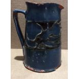 LIBERTY & CO., BARUM, NORTH DEVON, A LATE 19TH CENTURY POTTERY JUG The blue glaze with a