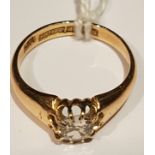 A VICTORIAN 18CT GOLD AND DIAMOND SINGLE STONE RING The old cut diamond claw set, in an open