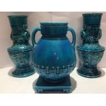 MINTON (POSSIBLY CHRISTOPHER DRESSER), A 19TH CENTURY MAJOLICA TURQUOISE GLAZE VASE Formed on a