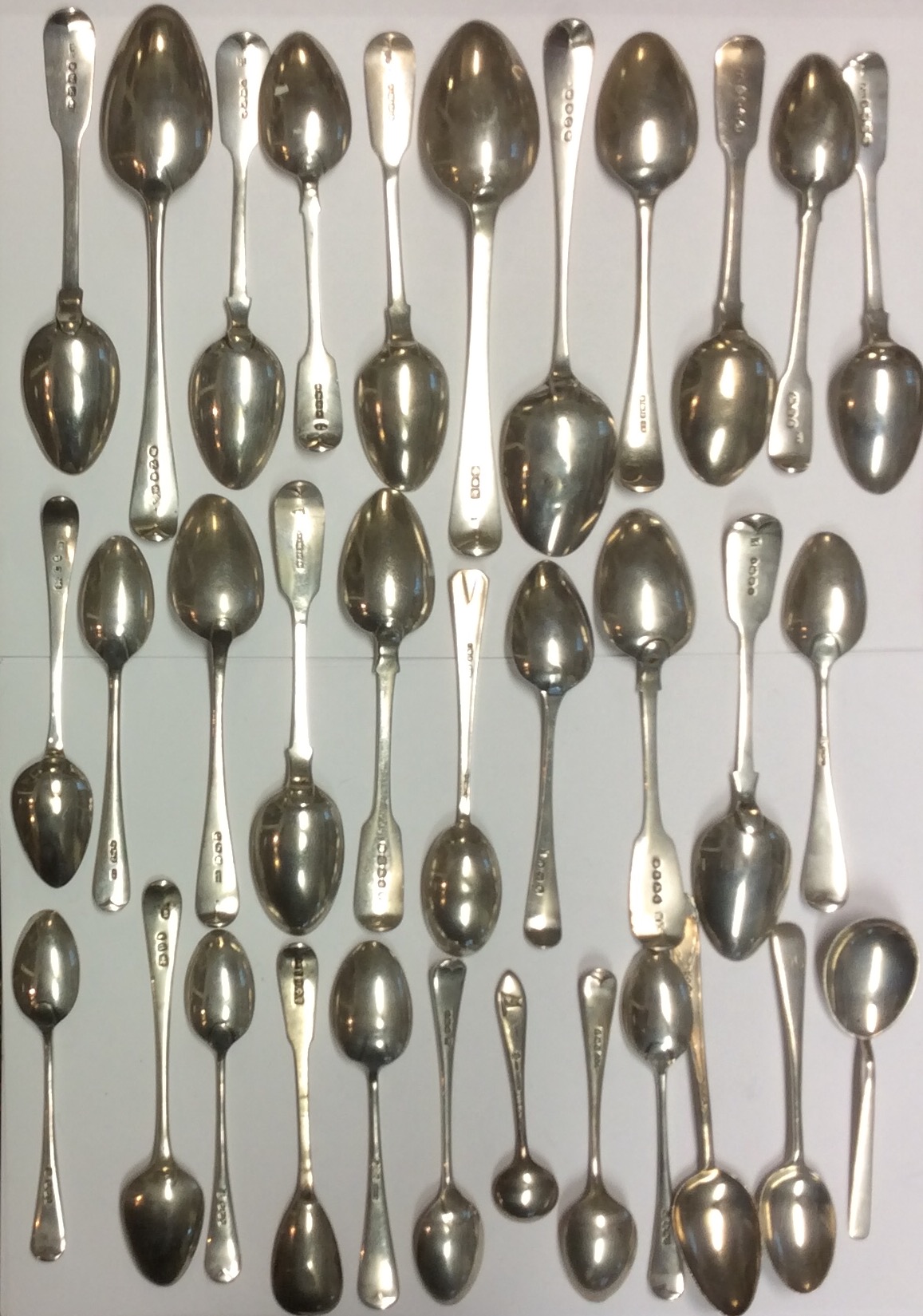 A COLLECTION OF THIRTY-THREE GEORGIAN AND LATER SILVER TEASPOONS Including London 1823, 1808 and