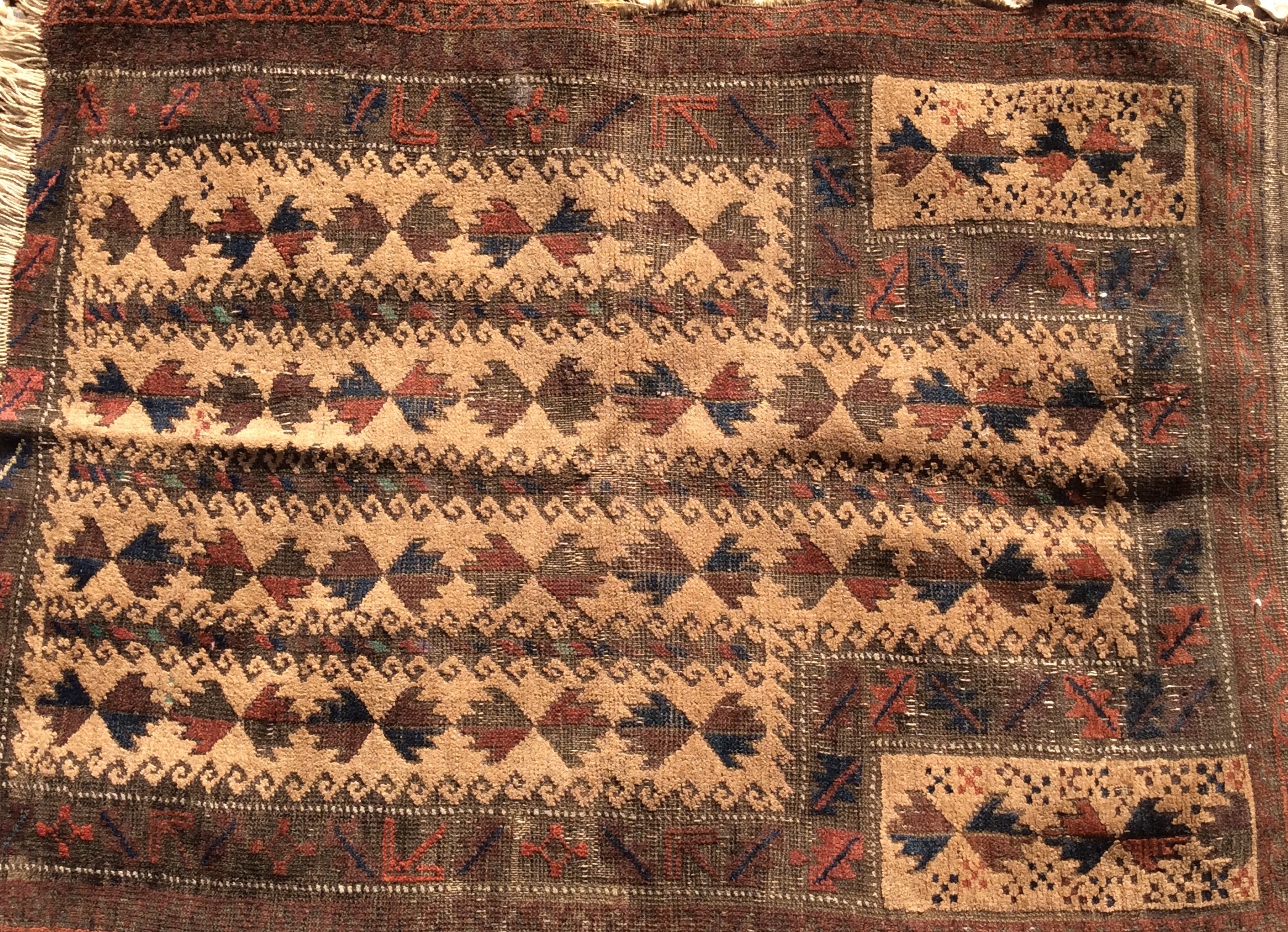 FOUR ANTIQUE PERSIAN RUGS To include one having a red field, with a geometric design and a black - Image 4 of 4