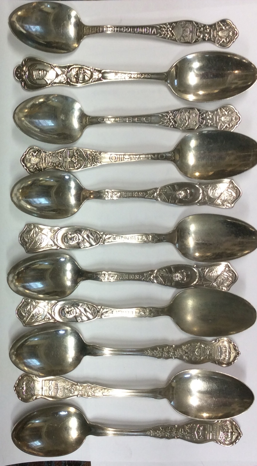 A COLLECTION OF VINTAGE SILVER PLATE COMMEMORATIVE SPOONS Depicting Lord Rogers and Field Marshall