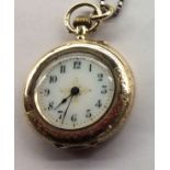 A LADIES' LATE 19TH/EARLY 20TH CENTURY 12CT GOLD FOB WATCH Having a circular white dial, Arabic