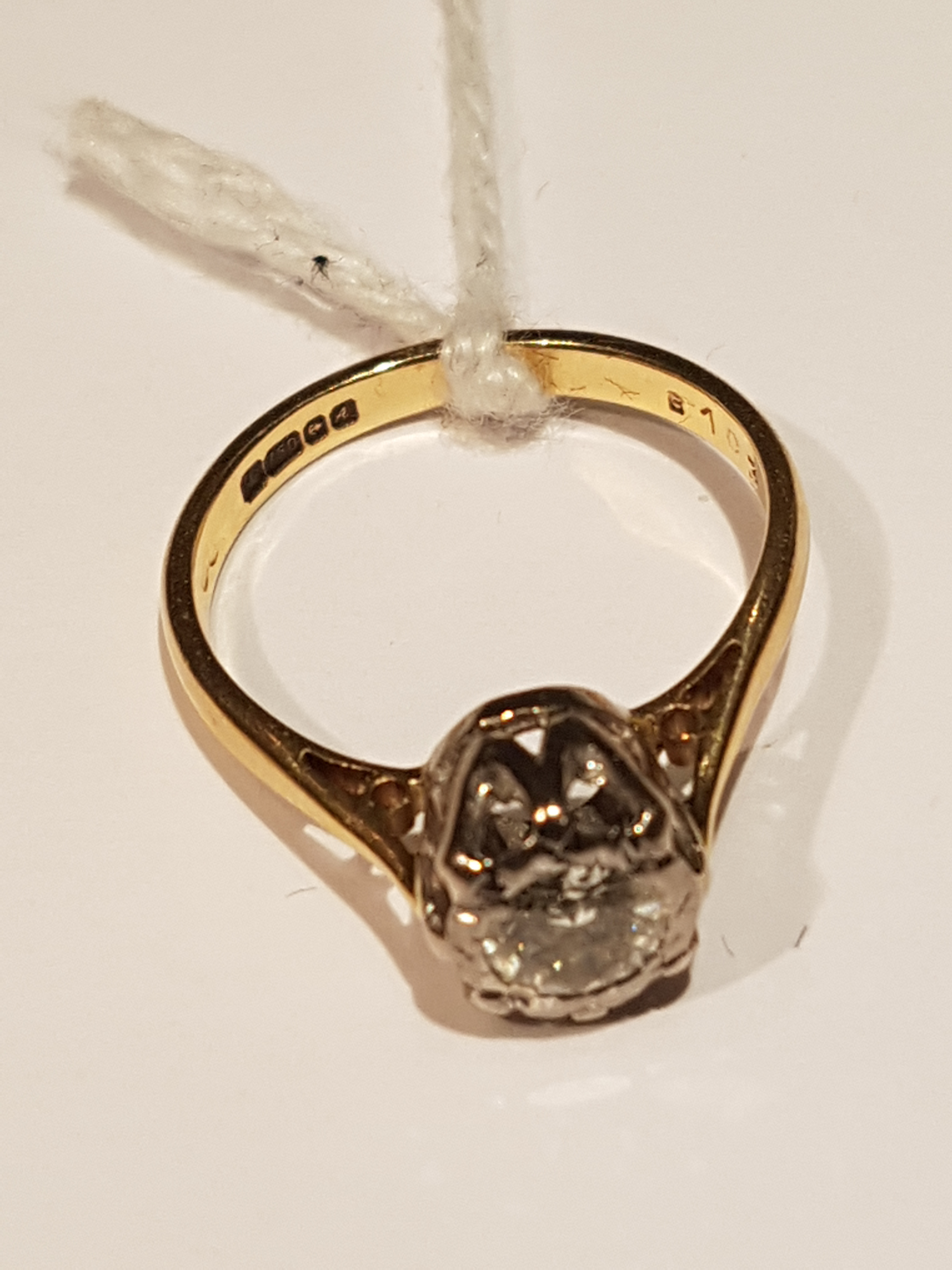 A HALLMARKED 18CT GOLD AND DIAMOND SOLITAIRE RING The brilliant cut diamond illusion set, to plain - Image 2 of 2