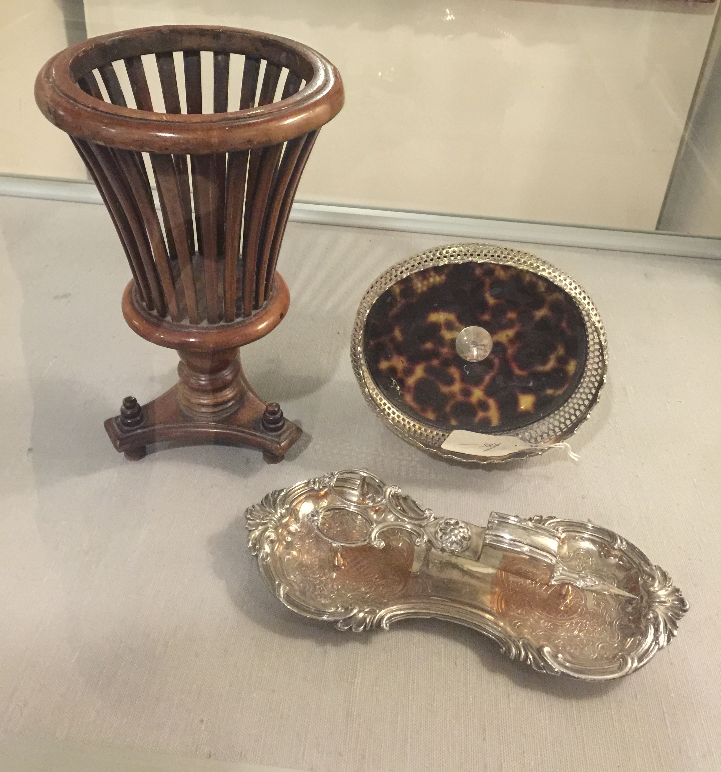 A 19TH CENTURY SILVER PLATED PIERCED BASKET With faux tortoiseshell base, along with a mahogany