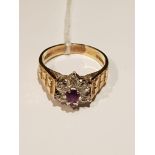 A HALLMARKED 9CT TWO COLOUR GOLD, AMETHYST AND DIAMOND FLOWERHEAD CLUSTER RING The round cut