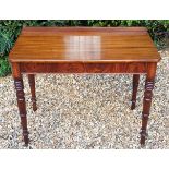 A VICTORIAN MAHOGANY SIDE TABLE (POSSIBLY CONVERTED CARD TABLE) Raised on ring turned legs, standing