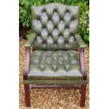 A GAINSBOROUGH DESIGN OPEN ARMCHAIR In green leather button back upholstery.