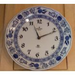 A HUTSCHENREUTHER CASED GERMAN PORCELAIN CLOCK With Junghans movement, with blue and white