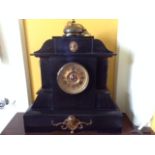 A LARGE 19TH CENTURY BELGIAN SLATE MANTEL CLOCK Of architectural style, with circular brass dial,