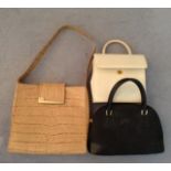 A COLLECTION OF THREE VINTAGE HANDBAGS Including a large alligator skin pattern bag, with gilt metal