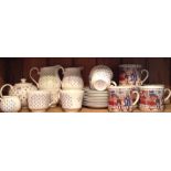 NINA CAMPBELL POTTERY, A COLLECTION OF DECORATIVE TEAWARE To include a teapot, two milk jugs,