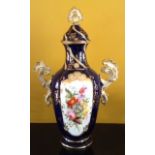 AN 18TH CENTURY ENGLISH PORCELAIN VASE AND COVER With Royal blue ground, having a central