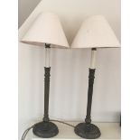 A PAIR OF BRONZE TABLE LAMPS AND SHADES Cast on spherical bases and having a bulbous knope and two