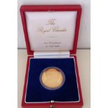 A 20TH CENTURY 24CT GOLD ONE TROY OUNCE COMMEMORATIVE COIN Celebrating the marriage of Prince