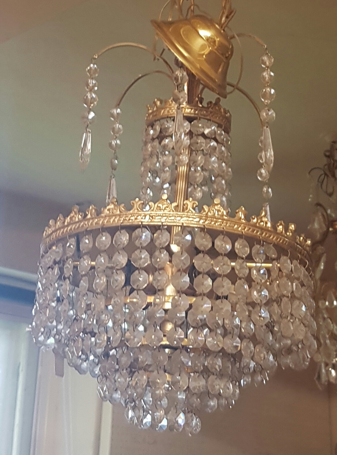 TWO 20TH CENTURY BRASS AND CRYSTAL CEILING LIGHT FITTINGS Four branch with glass drip fans and