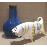 A MIDWINTER STATUE OF A BULL Along with a Denby stoneware blue vase.