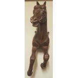 A 19TH CENTURY PINE HEAD AND SHOULDERS SECTION OF A CAROUSEL HORSE With glass eyes. (76cm x 21cm x