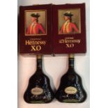 X.O. HENNESSY COGNAC, TWO PEAR FORM BOTTLES Moulded with grapes and vines, retaining original