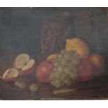 A LATE 19TH/EARLY 20TH CENTURY OIL ON CANVAS Still life, depicting grapes, apples and lemons, with a